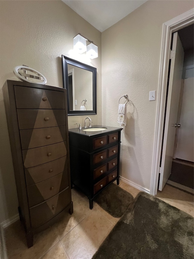 bathroom with vanity and tile patterned flooring