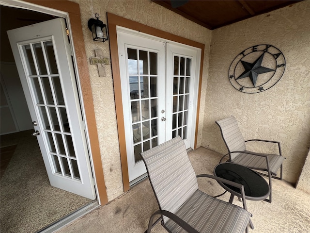 balcony featuring french doors