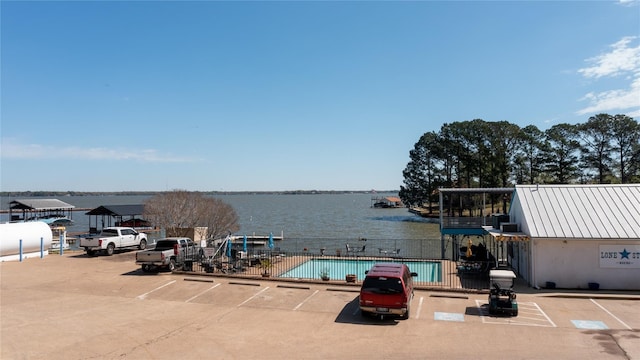 dock area with a water view