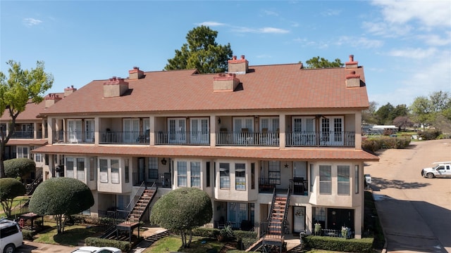 exterior space featuring a balcony