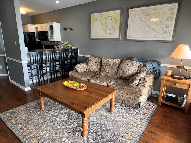 living room featuring dark hardwood / wood-style floors