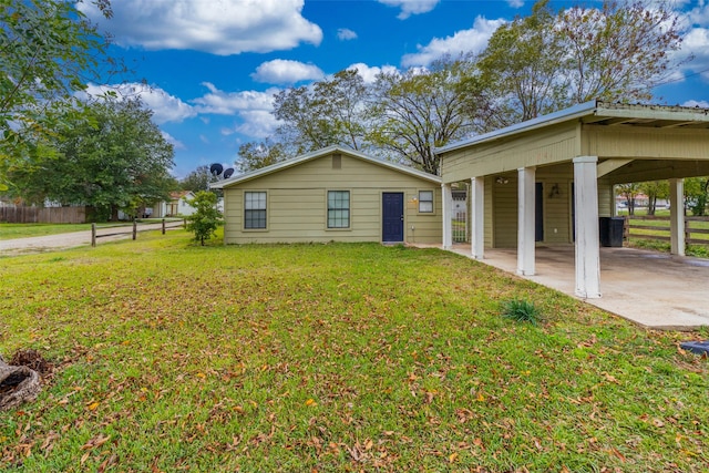 view of home's exterior with a lawn