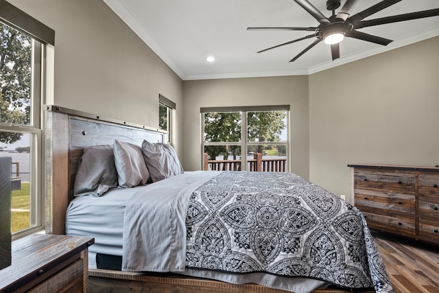 bedroom featuring ceiling fan, crown molding, and wood-type flooring