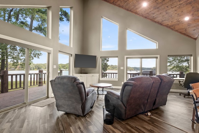 living room with hardwood / wood-style flooring, wood ceiling, and high vaulted ceiling