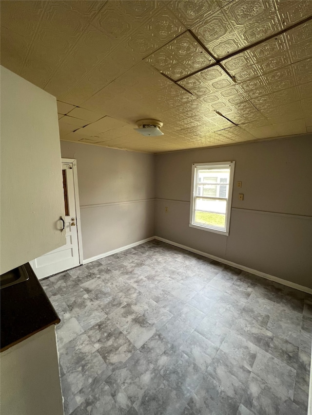 spare room with tile patterned floors