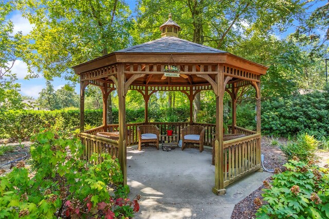 view of property's community with a patio and a gazebo