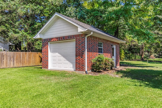 garage with a lawn