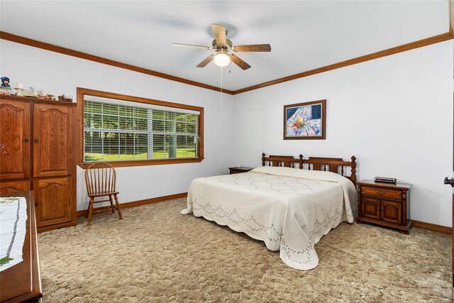 bedroom with ceiling fan, crown molding, and light colored carpet