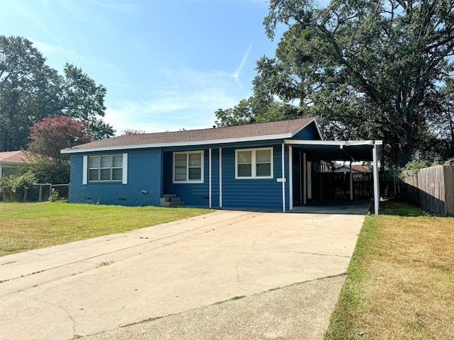 single story home featuring a carport and a front yard