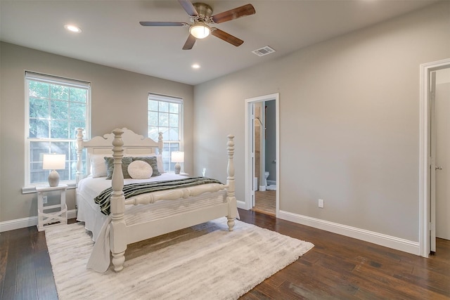 bedroom featuring dark hardwood / wood-style flooring and ceiling fan