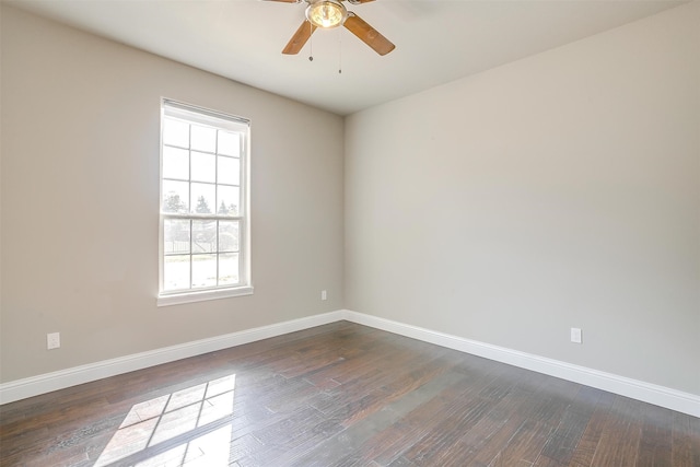 unfurnished room with ceiling fan, a healthy amount of sunlight, and dark hardwood / wood-style floors