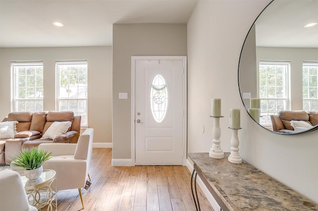 entryway featuring light hardwood / wood-style flooring and a wealth of natural light