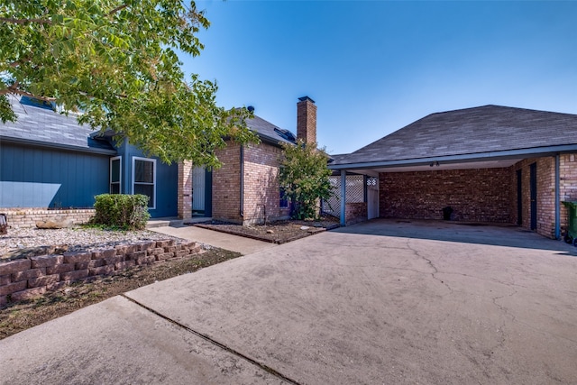 view of front of house with a carport