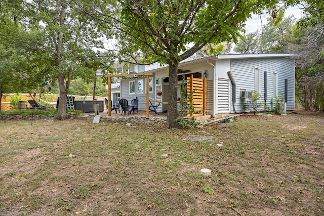 rear view of house with a playground