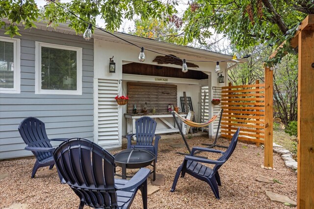 view of patio / terrace with an outdoor fire pit