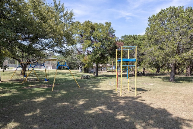 view of jungle gym with a yard