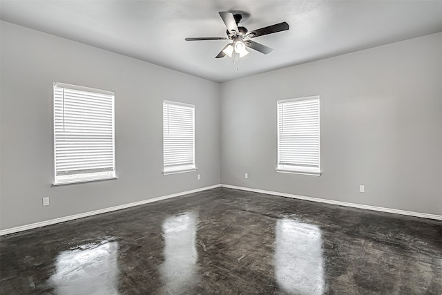 spare room featuring ceiling fan