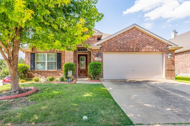 view of front of home featuring a garage and a front lawn