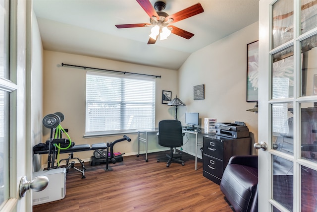 home office with ceiling fan, vaulted ceiling, and dark wood-type flooring