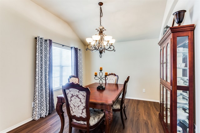 dining space with a notable chandelier, dark hardwood / wood-style floors, and lofted ceiling