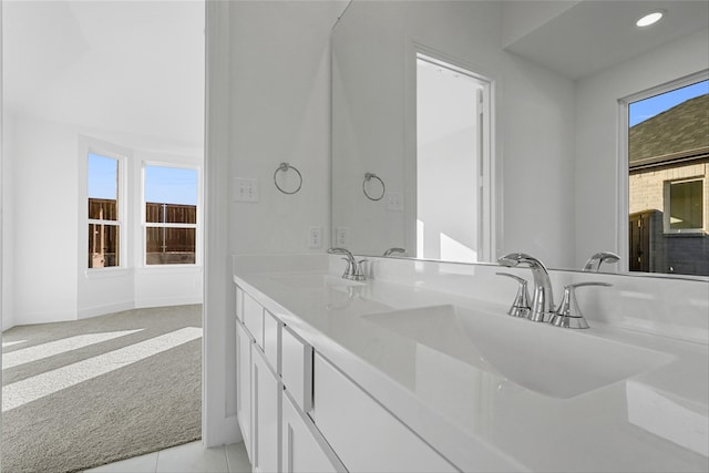 bathroom featuring tile patterned floors and vanity