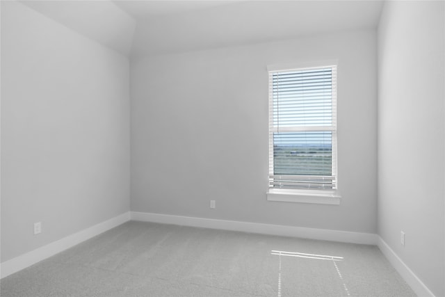 empty room with light colored carpet