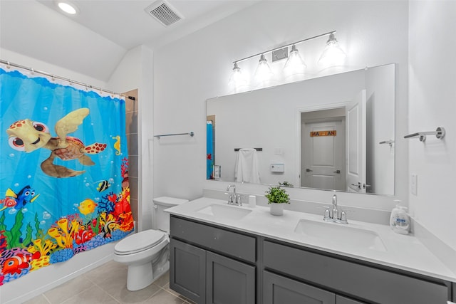 full bathroom featuring tile patterned floors, vanity, toilet, and shower / tub combo with curtain