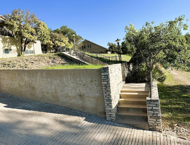 exterior details featuring fence