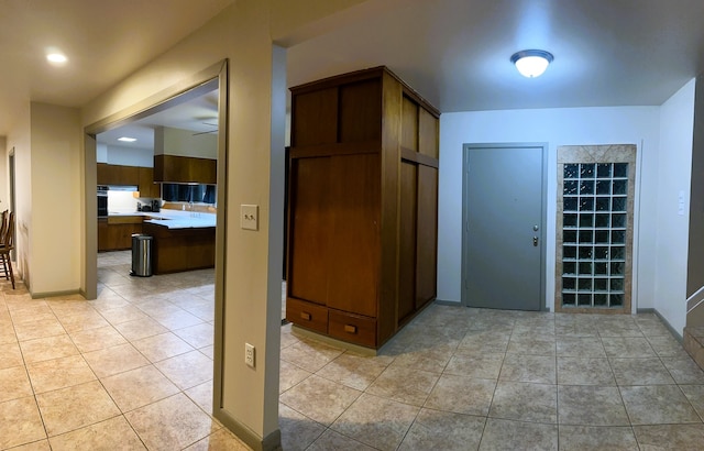 interior space with light tile patterned floors