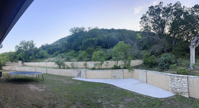 view of yard featuring a trampoline