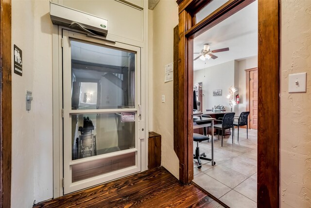 hall featuring wood finished floors
