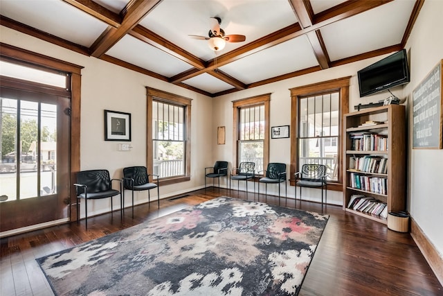 sitting room with ceiling fan, wood-type flooring, baseboards, and coffered ceiling
