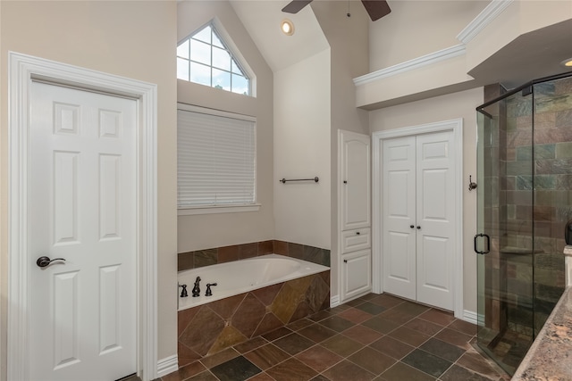 bathroom featuring ceiling fan, high vaulted ceiling, tile patterned flooring, and shower with separate bathtub