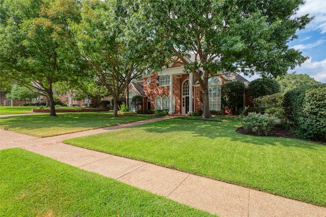 view of front of home featuring a front yard