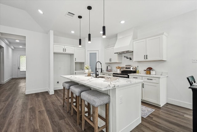 kitchen with white cabinetry, stainless steel electric range oven, dark hardwood / wood-style flooring, and a kitchen island with sink