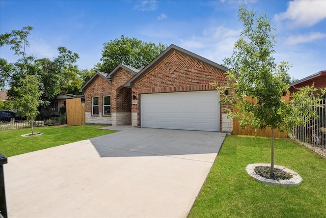 view of front property with a front yard and a garage