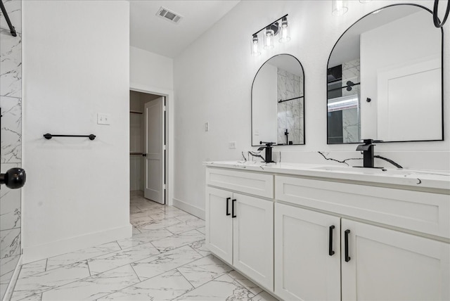 bathroom with vanity and tile patterned floors