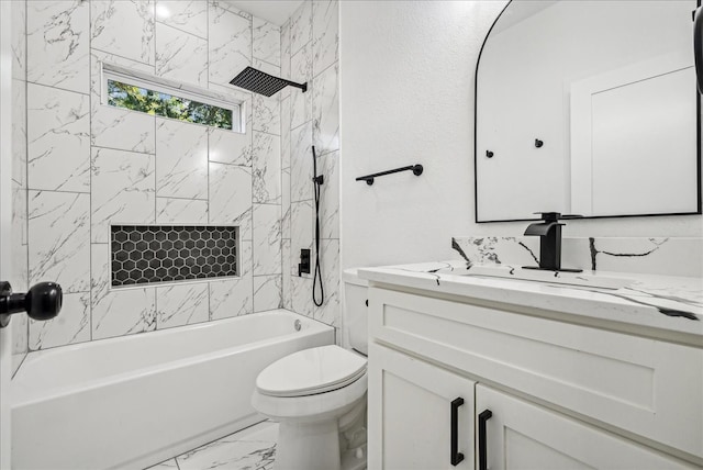 full bathroom with tile patterned flooring, vanity, toilet, and tiled shower / bath