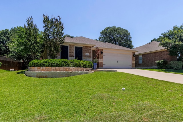 single story home with a front yard and a garage