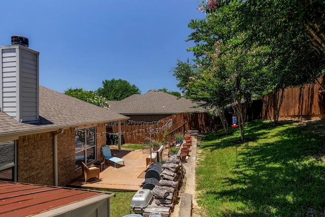 view of yard with a wooden deck