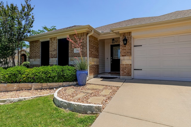 ranch-style house featuring a garage