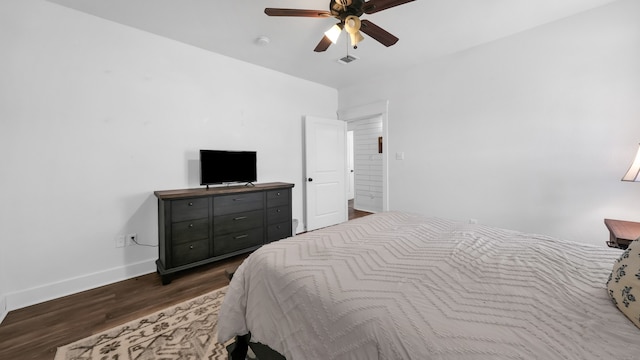 bedroom featuring hardwood / wood-style floors and ceiling fan