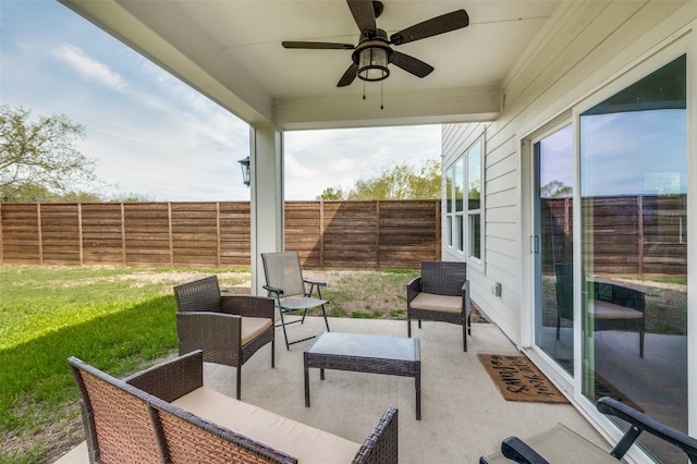 view of patio featuring an outdoor hangout area and ceiling fan