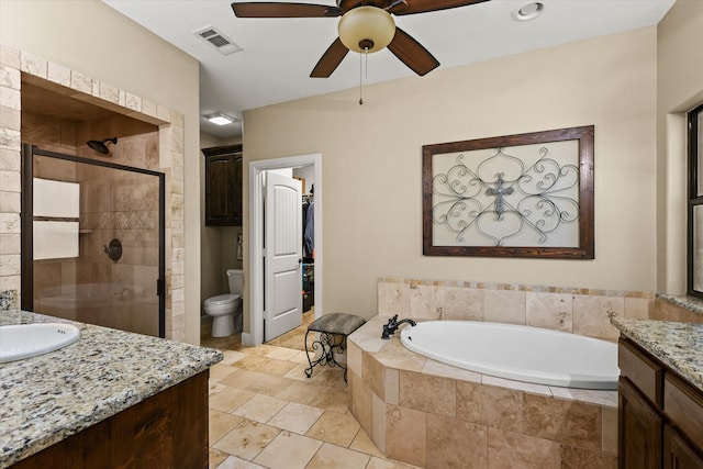 full bathroom featuring toilet, separate shower and tub, tile patterned flooring, vanity, and ceiling fan