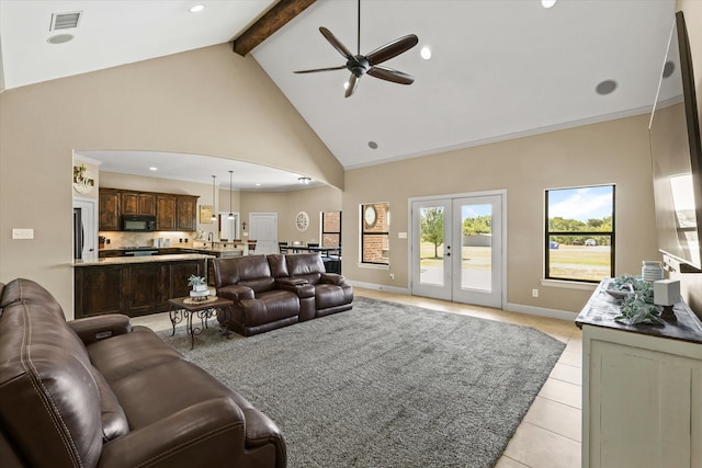 living room with beamed ceiling, light tile patterned floors, french doors, high vaulted ceiling, and ceiling fan