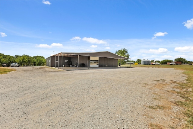 exterior space with an outbuilding