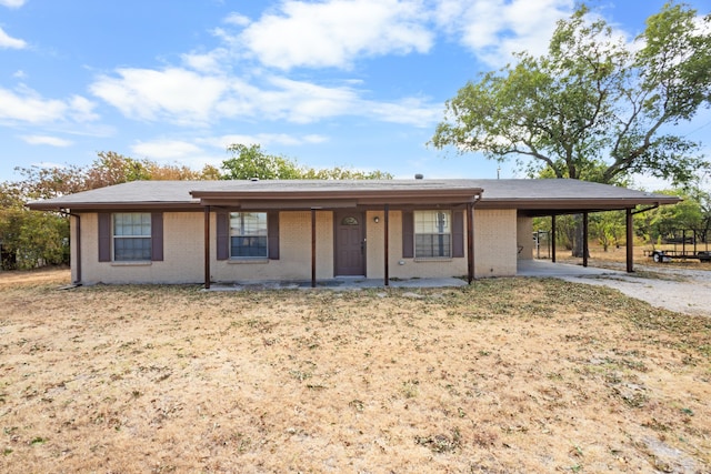 single story home with a carport