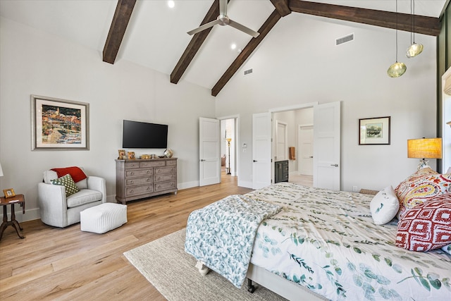 bedroom with high vaulted ceiling, light hardwood / wood-style flooring, and beamed ceiling