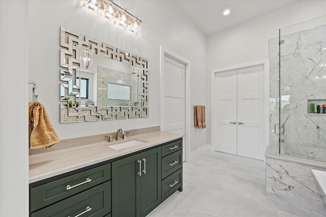 bathroom with vanity, an enclosed shower, and tile patterned flooring