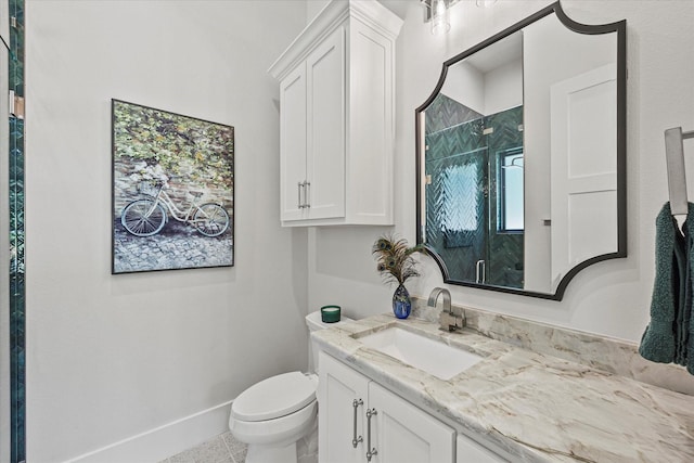 9 Meadowlake Dr, Heath, TX 75032 - bathroom with baseboards, vanity, a shower stall, and toilet